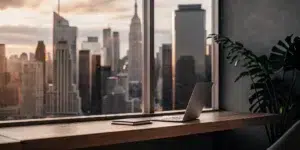 Entrepreneur writing Instagram bio on laptop.