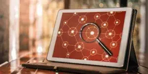 Tablet visualizing NLP's connection to SEO.