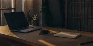 SEO checklist and performance tracking tools on a desk.