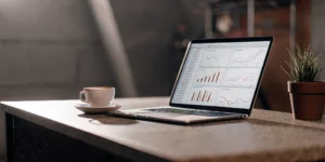 Webflow SEO app analytics dashboard on laptop.