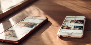 Facebook and Instagram apps open on smartphones.