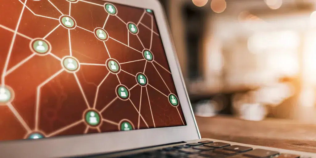 SEMrush internal linking network analysis on laptop.