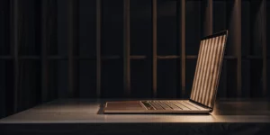 A laptop on a desk used for a content repurposing guide to drive more traffic.