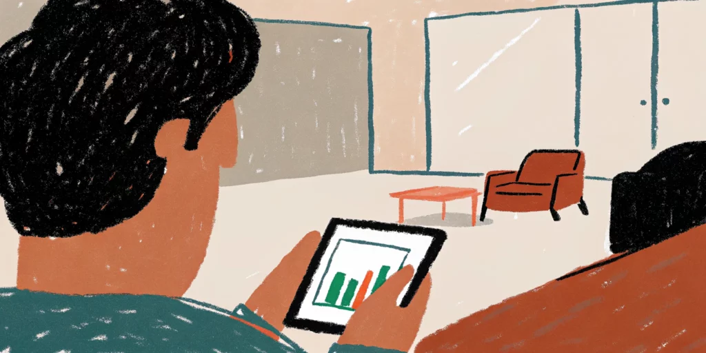 Ecommerce professional reviewing product page analytics on a tablet in a modern office