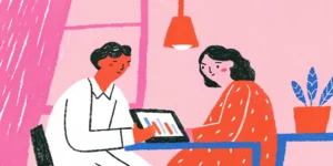 Business professionals discussing SEO performance data in a modern office